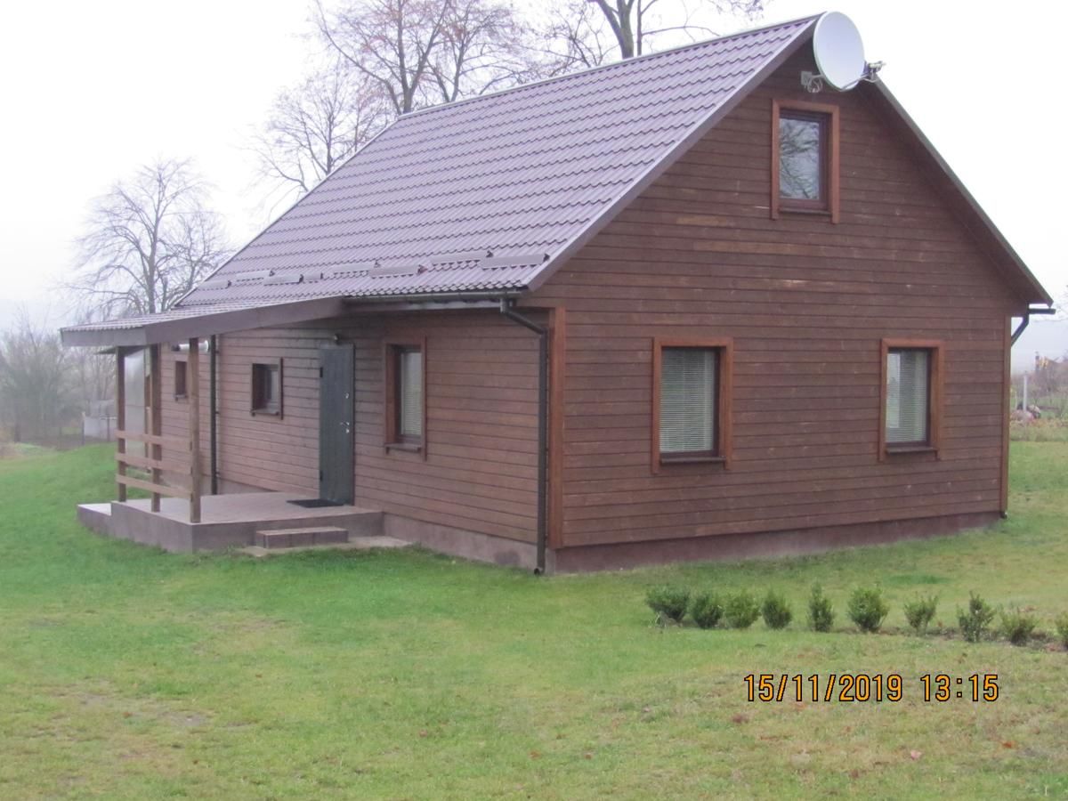 Дома для отпуска Под липами в Дмитровичах Dmitrovichi