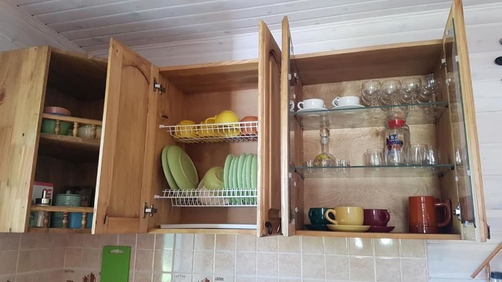 Дома для отпуска Под липами в Дмитровичах Dmitrovichi